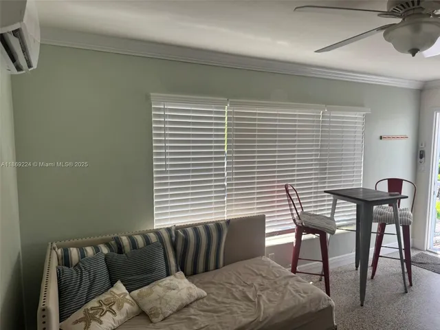 a view of a room with a window