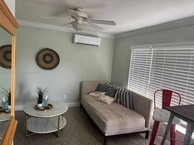 a kitchen with stainless steel appliances a stove microwave and refrigerator