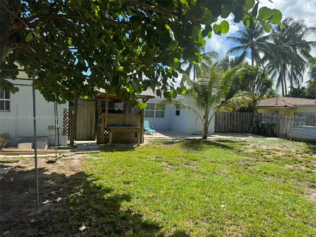 a view of entryway with wooden walls