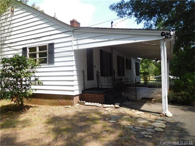 1980 Troutman Hill Road Kannapolis, NC 28083 - Photo 2 of 12 a view of a house with backyard and trees