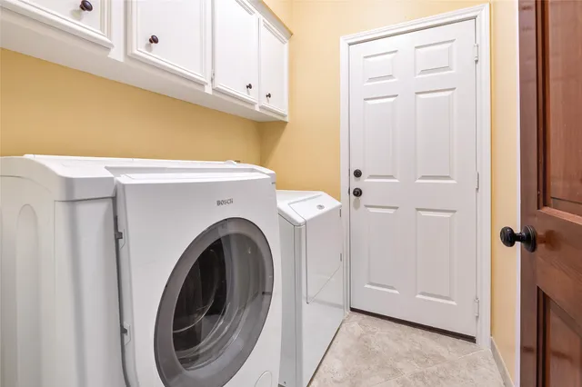 a view of an empty room with a fireplace