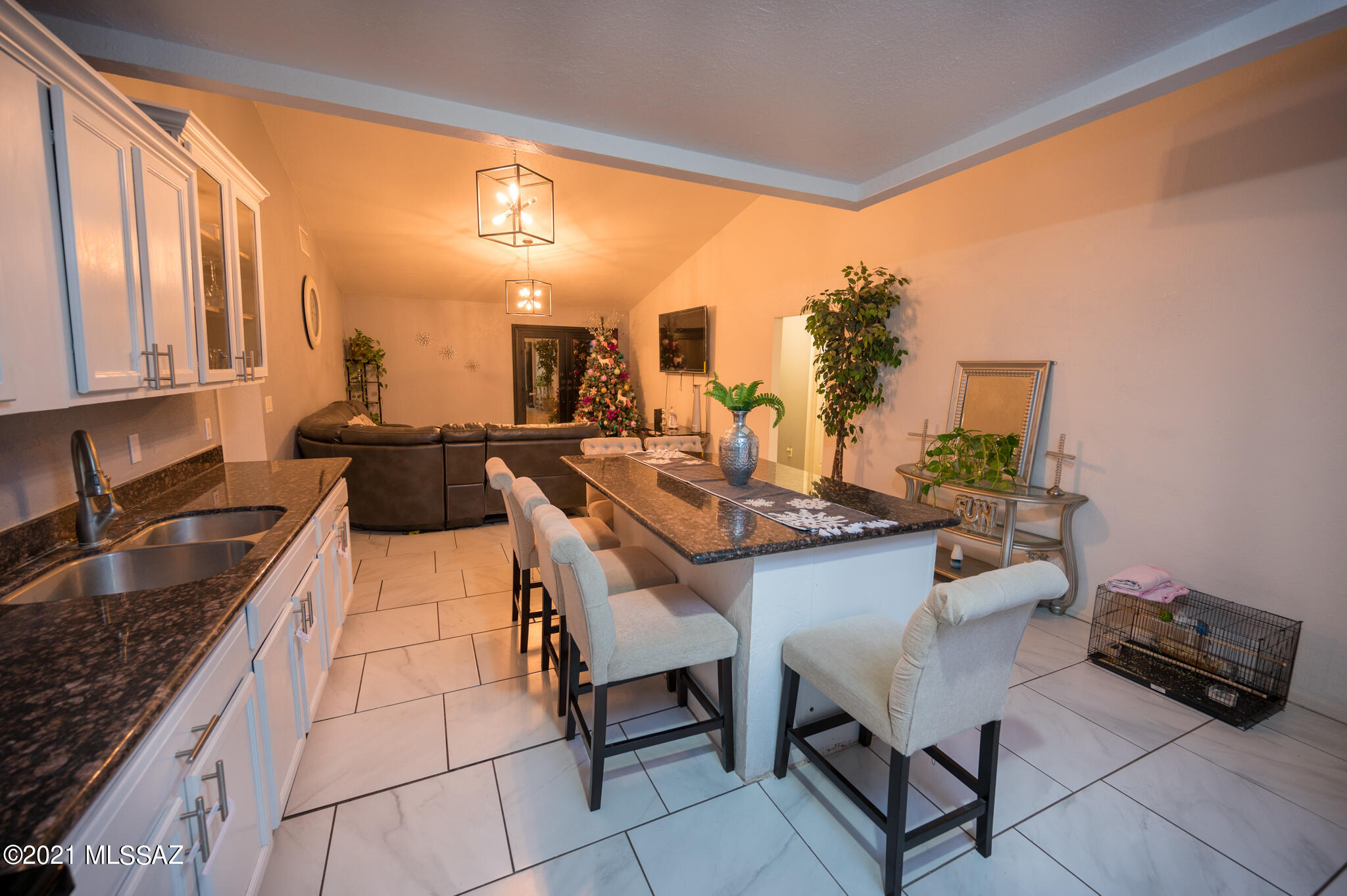 577 Camino Lito Galindo Rio Rico, AZ 85648 - Photo 11 of 19 a kitchen with a sink and living room view