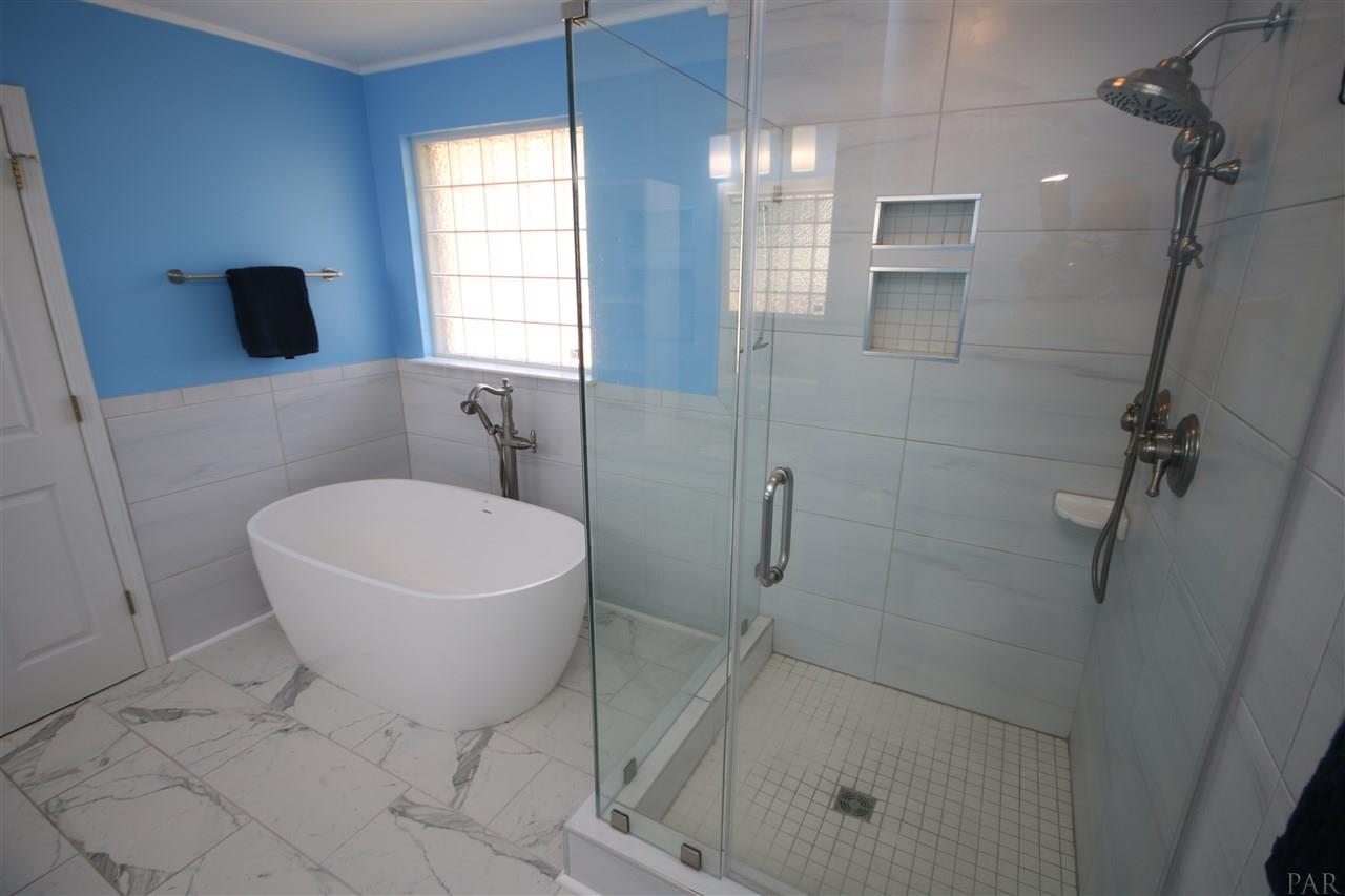 4934 Timber Ridge Drive Pace, FL 32571 - Photo 29 of 46 shower with frameless door.