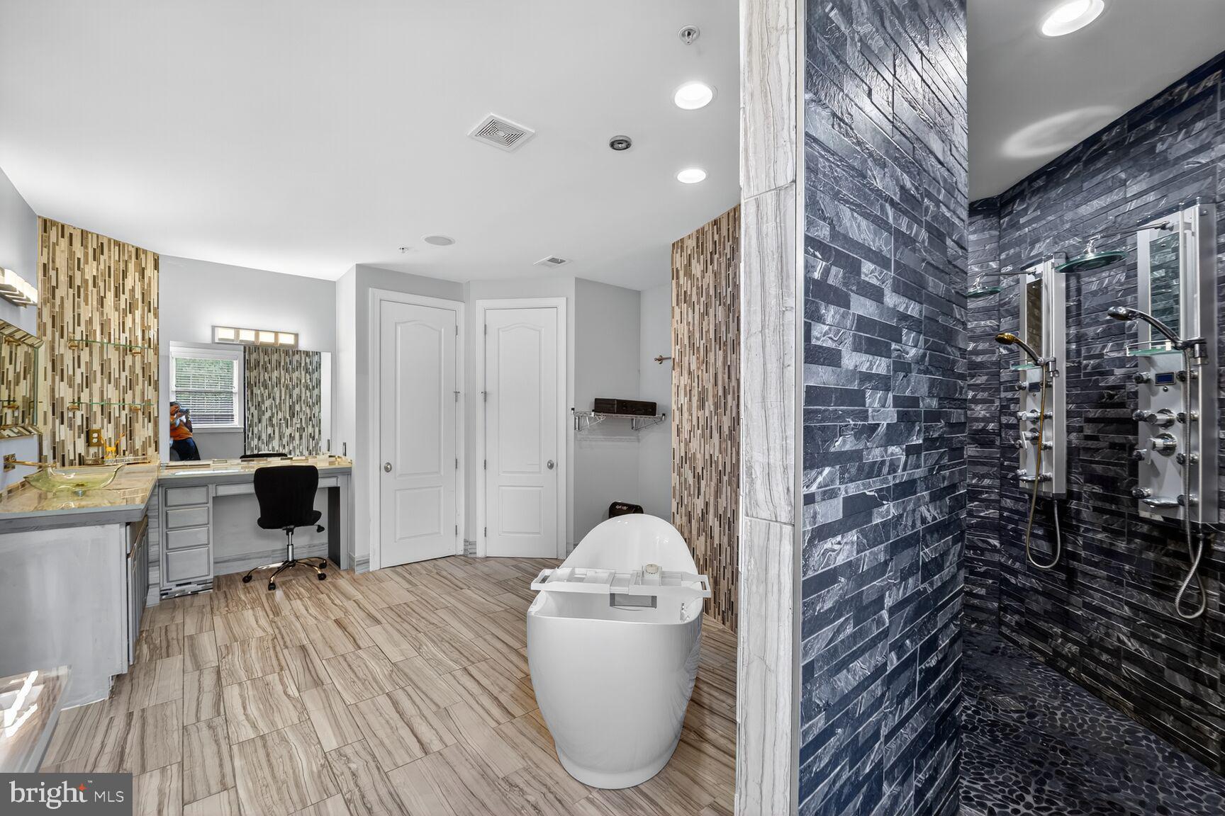 16831 Swanson Road Upper Marlboro, MD 20774 - Photo 33 of 56 a hallway with a toilet and a view of living room