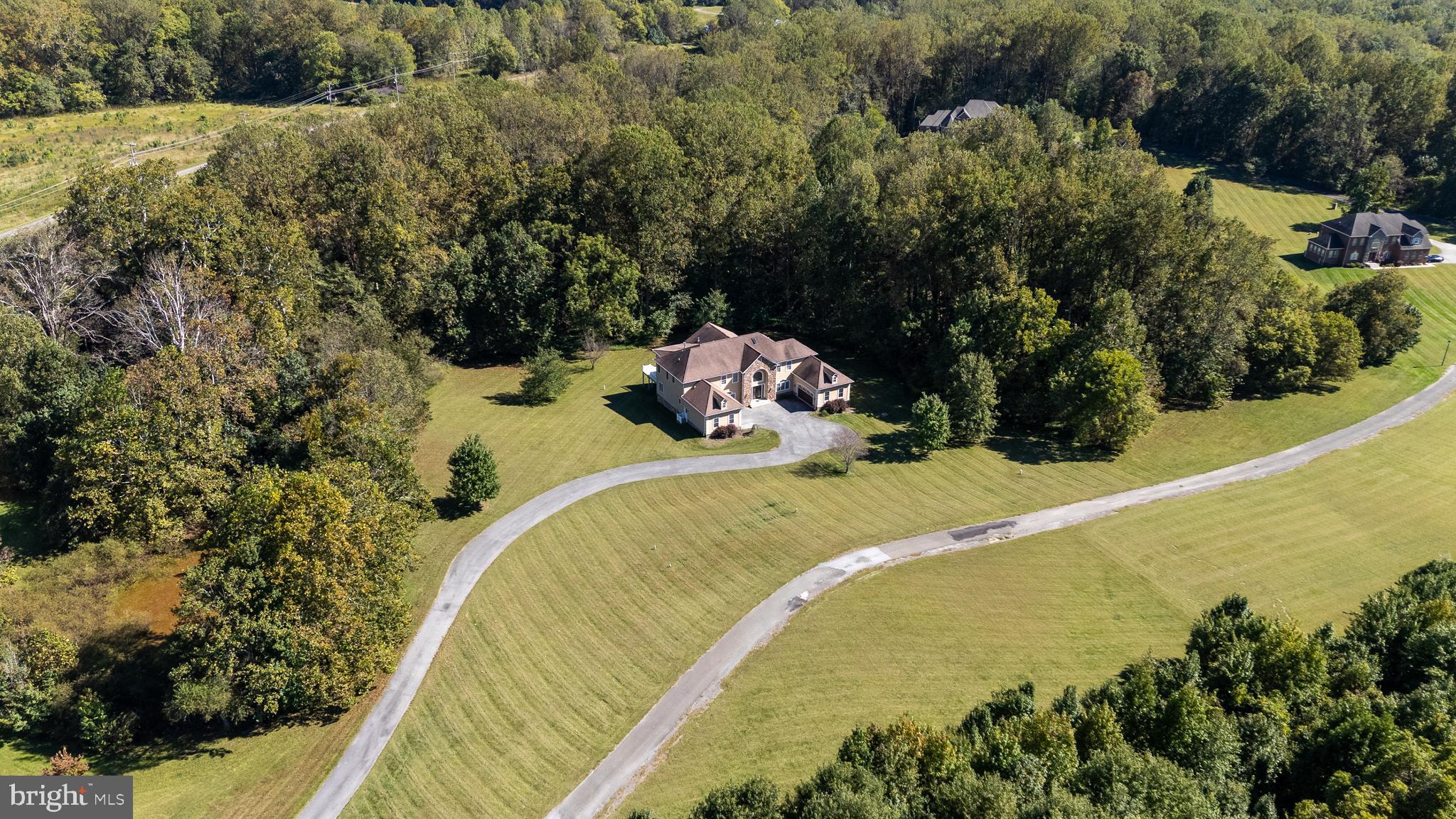 16831 Swanson Road Upper Marlboro, MD 20774 - Photo 4 of 56 a view of a swimming pool with a yard