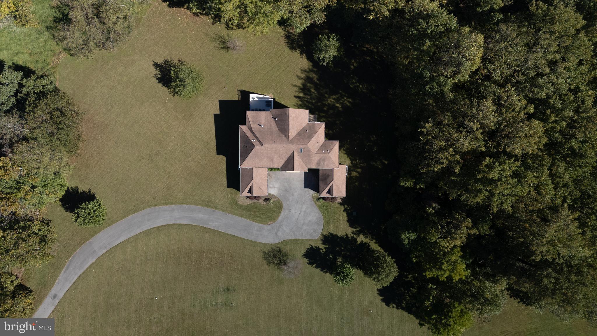 16831 Swanson Road Upper Marlboro, MD 20774 - Photo 5 of 56 an aerial view of a house with a yard and lake view