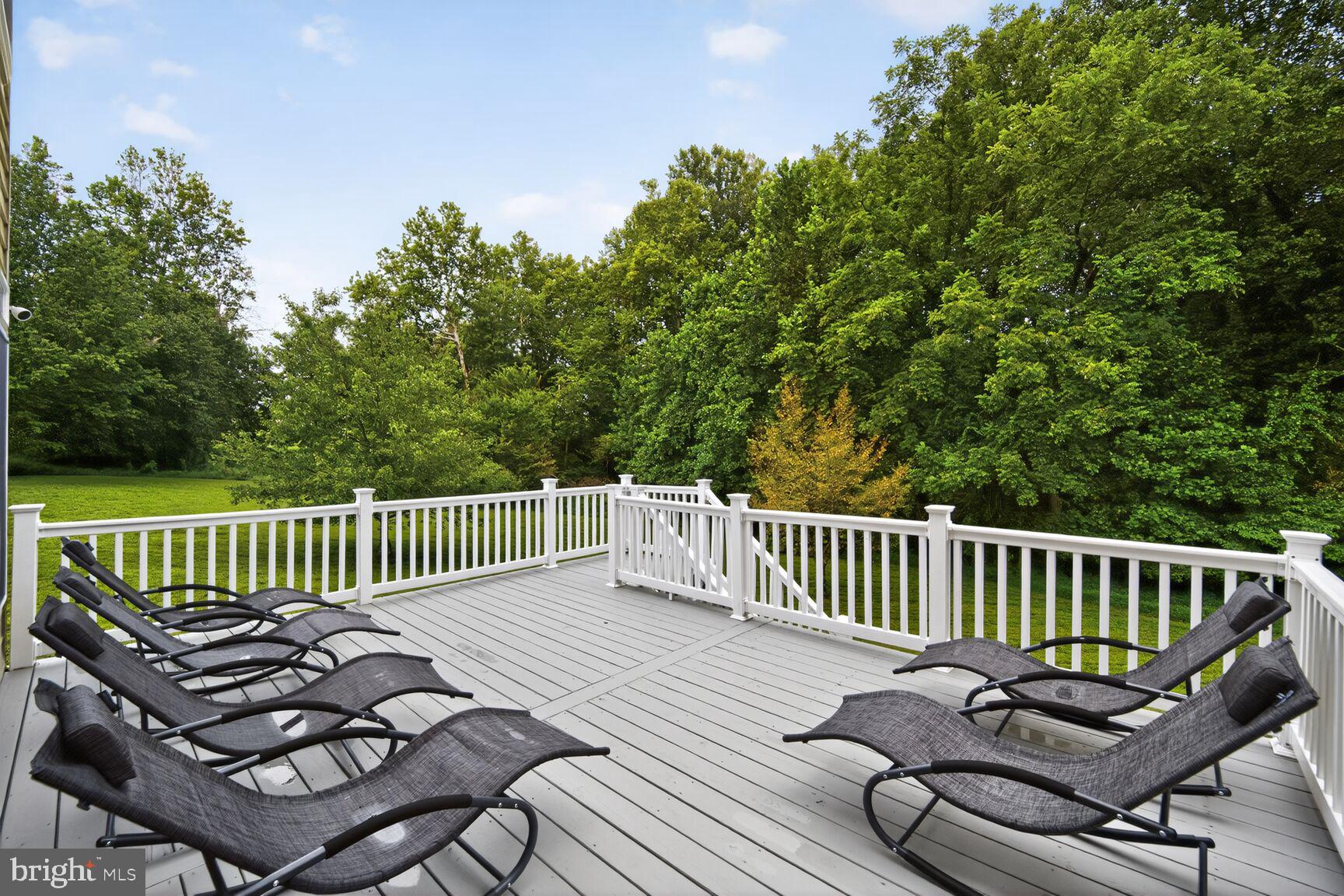 16831 Swanson Road Upper Marlboro, MD 20774 - Photo 54 of 56 a view of a deck with a chair
