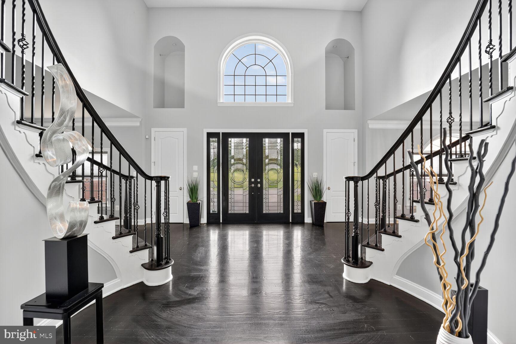 16831 Swanson Road Upper Marlboro, MD 20774 - Photo 6 of 56 a view of entryway with wooden floor and a front door