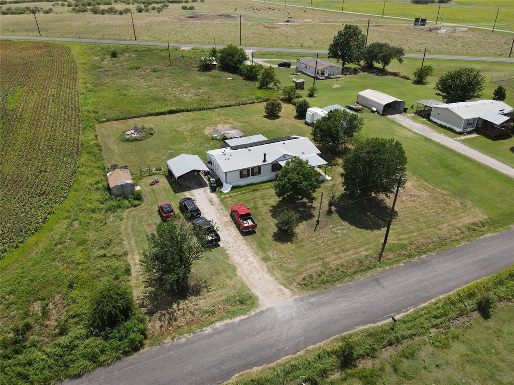 15962 Fritcher Road Pilot Point, TX 76258 - Photo 1 of 24 an aerial view of a houses with outdoor space