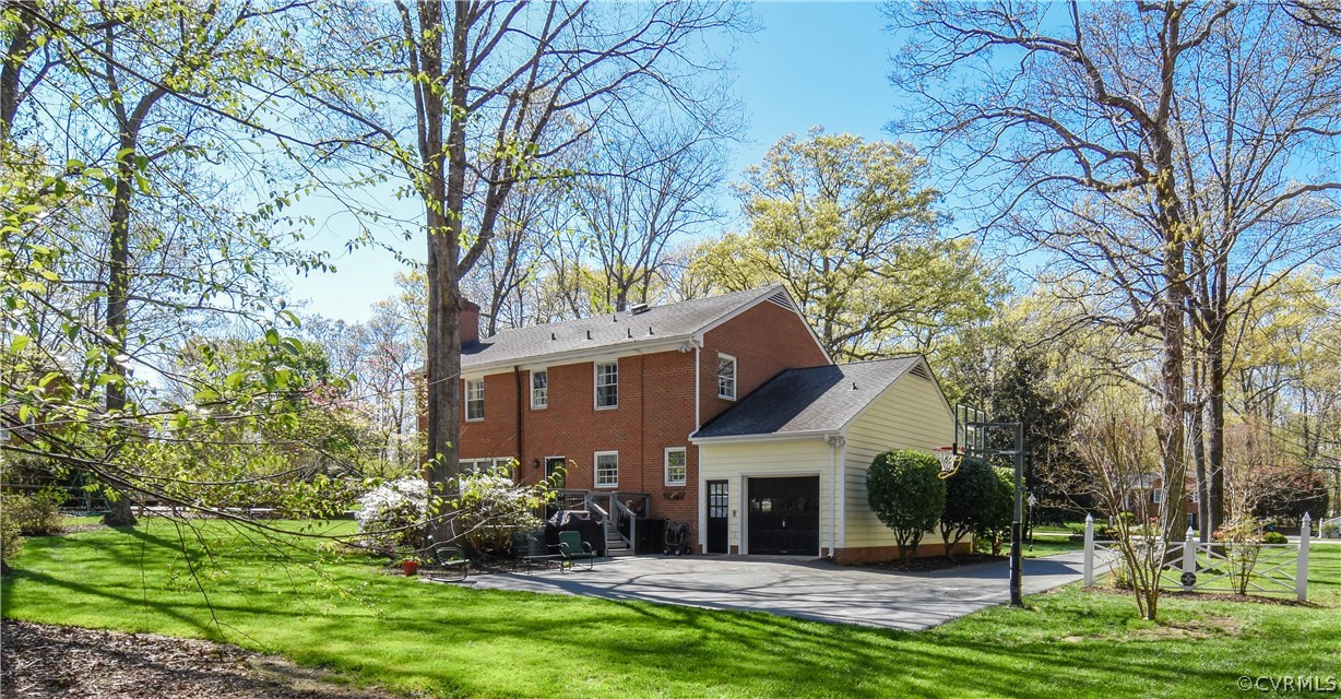 2711 Salisbury Road Midlothian, VA 23113 - Photo 41 of 47 a view of a house with garden and trees