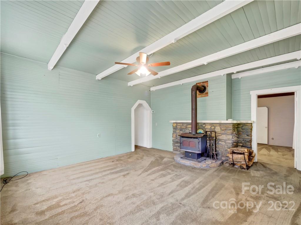 2731 Redmon Road Marshall, NC 28753 - Photo 25 of 43 a bedroom with furniture and a window