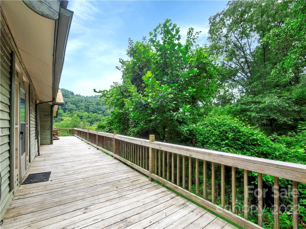 2731 Redmon Road Marshall, NC 28753 - Photo 4 of 43 a view of balcony with wooden floor and fence