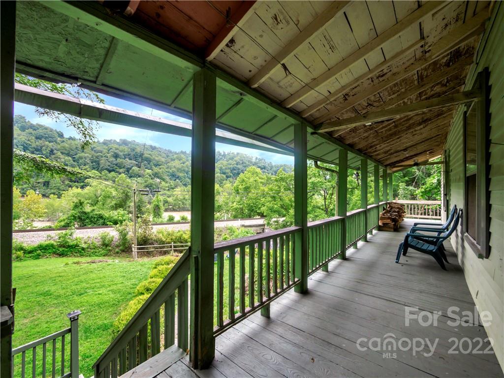 2731 Redmon Road Marshall, NC 28753 - Photo 9 of 43 a view of a porch with wooden floor and outdoor space