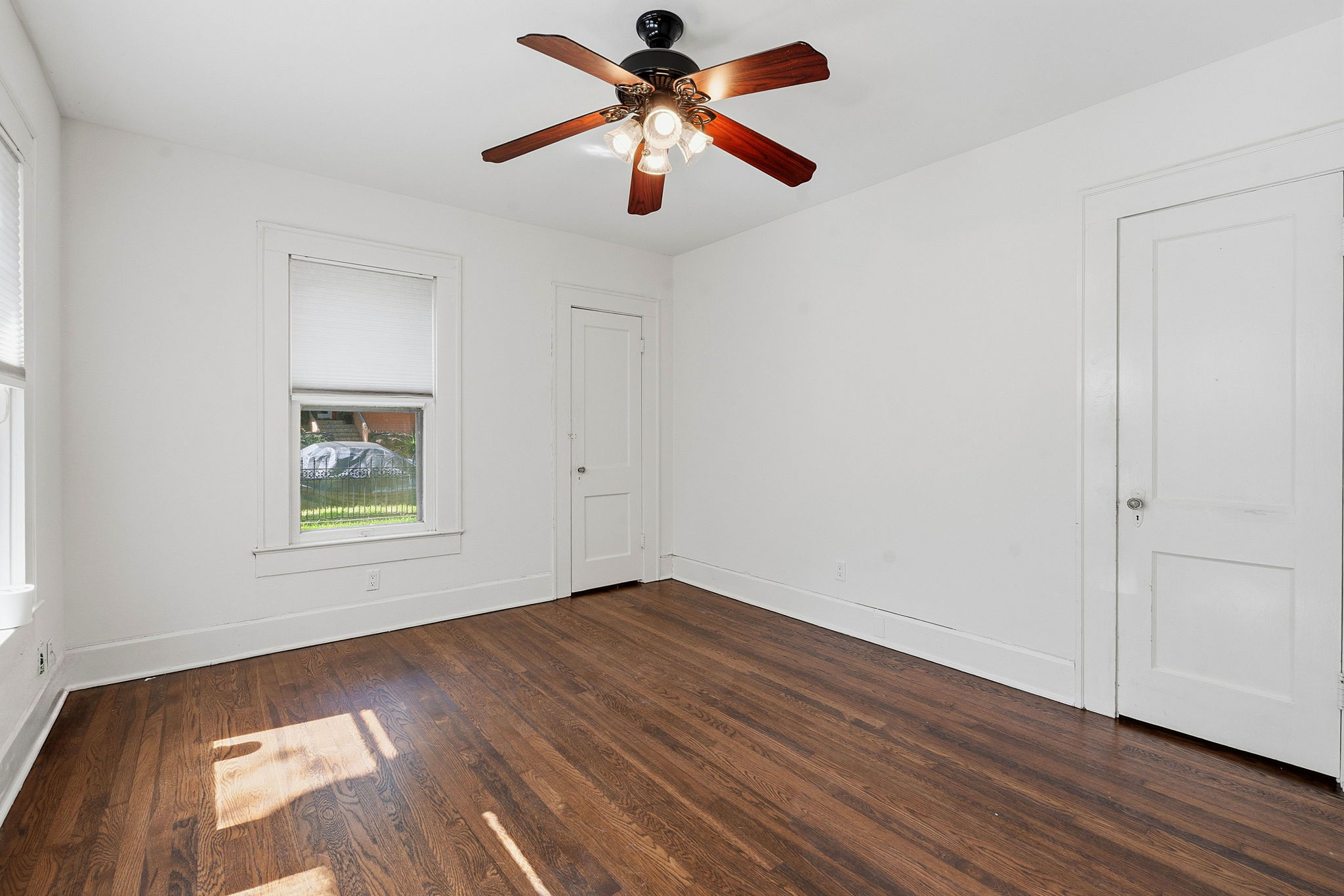 804 Rutherford Place, Unit A Austin, TX 78704 - Photo 12 of 17 a view of room window and wooden floor
