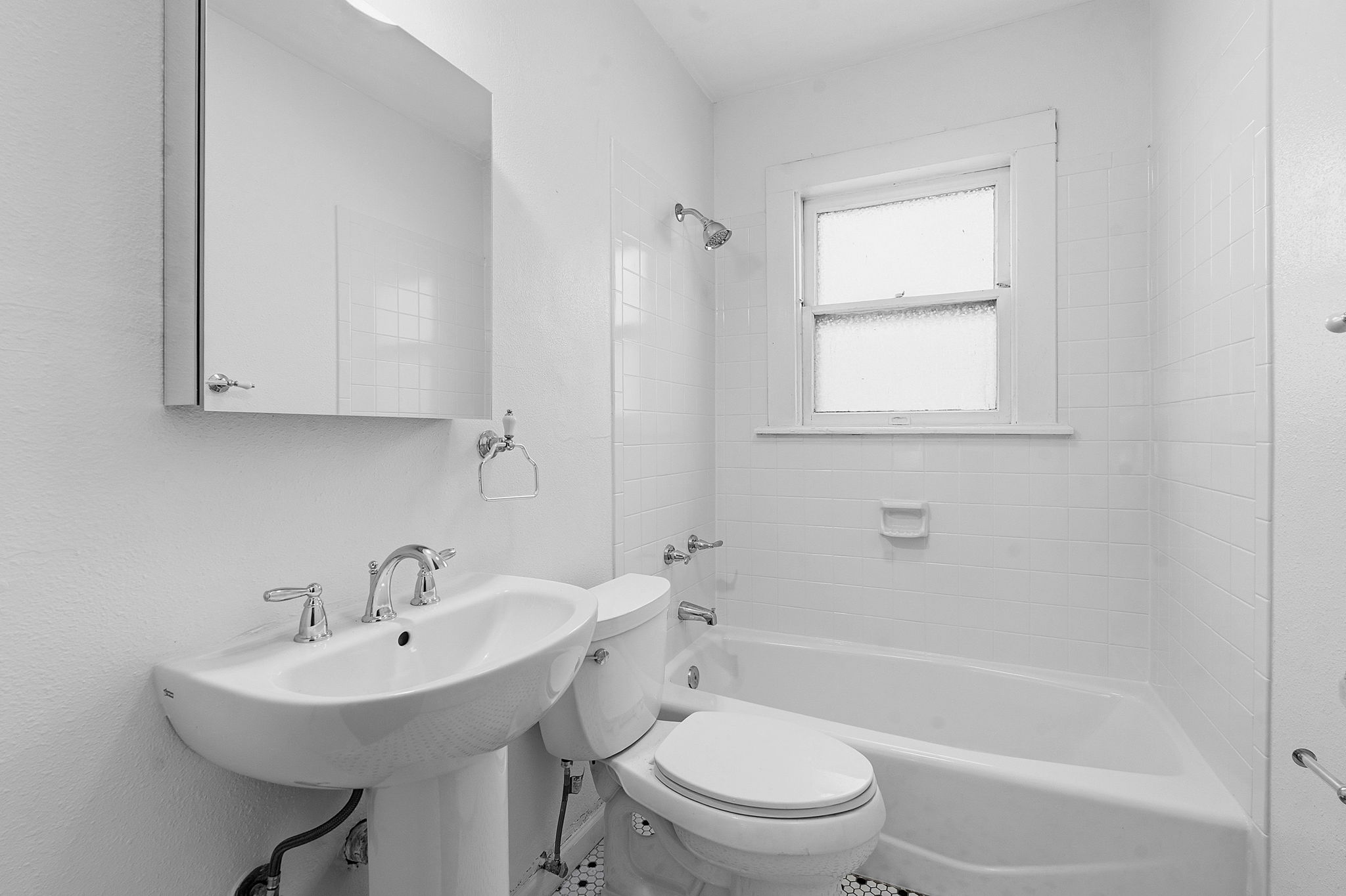 804 Rutherford Place, Unit A Austin, TX 78704 - Photo 13 of 17 a bathroom with a sink toilet and shower