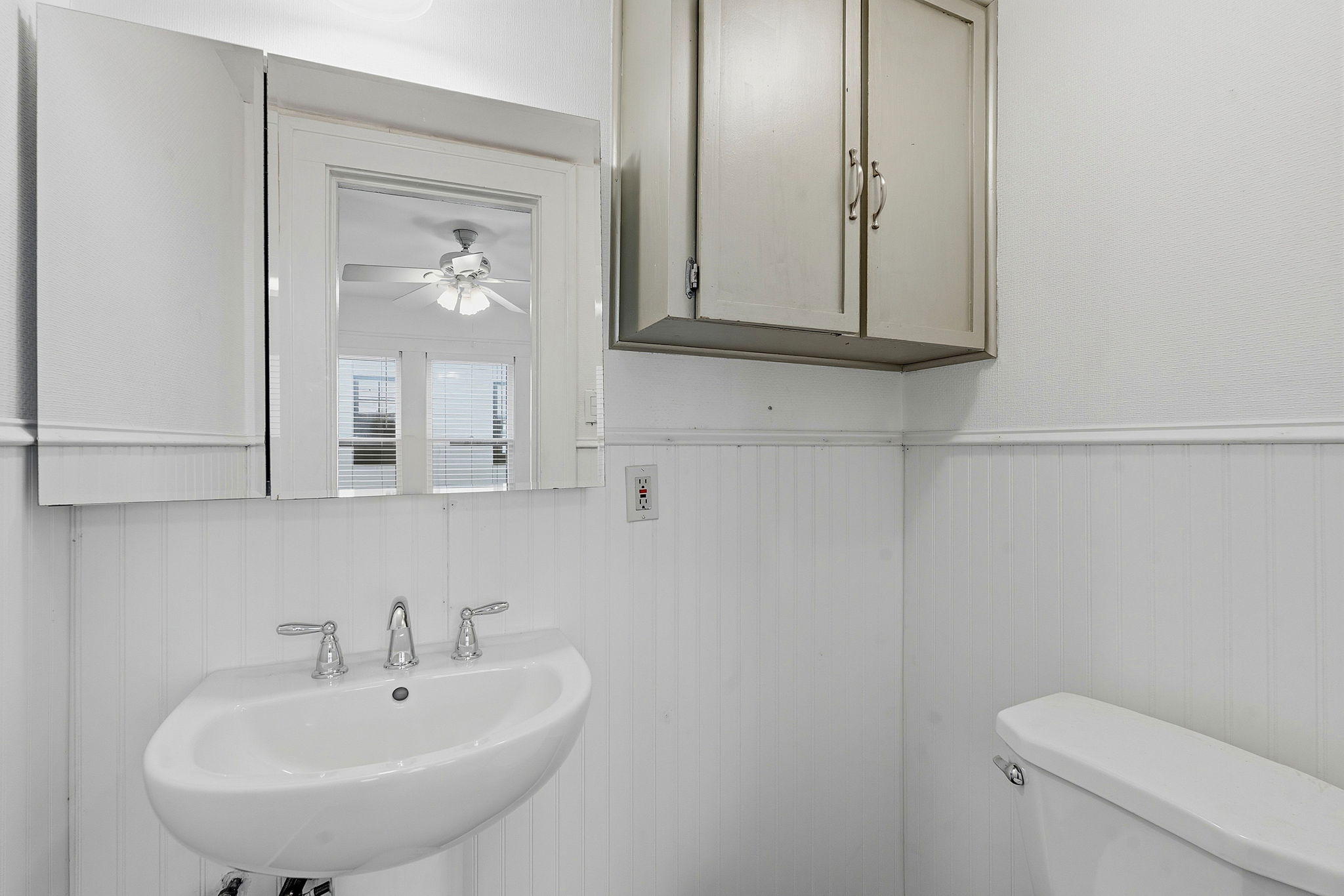 804 Rutherford Place, Unit A Austin, TX 78704 - Photo 16 of 17 a bathroom with a sink and a toilet