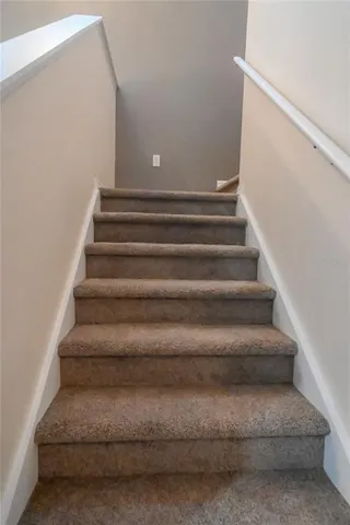 a view of balcony with wooden floor