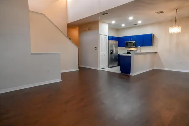 a view of kitchen with wooden floor