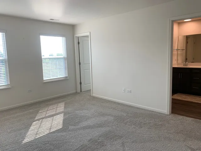 an empty room with windows