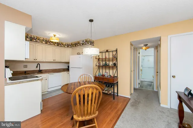 a kitchen with a stove and a microwave