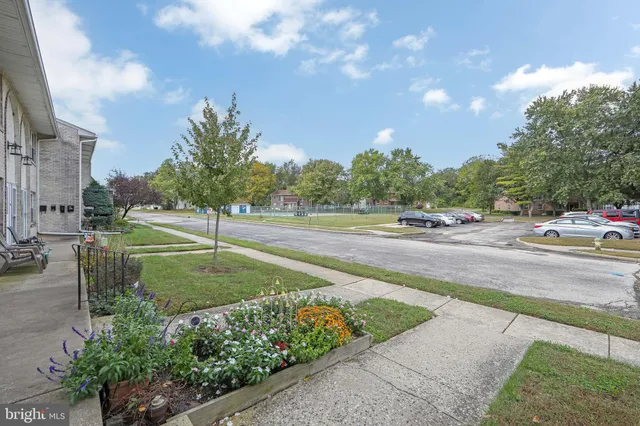 a view of balcony with wooden floor