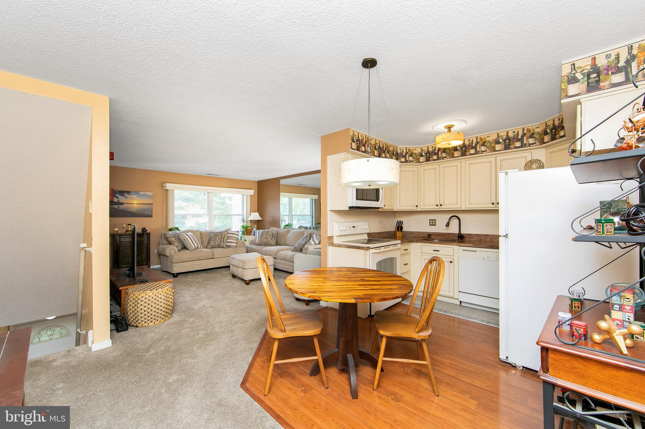 206 Winding Way Westville, NJ 08093 - Photo 7 of 20 a dining room with furniture and a chandelier