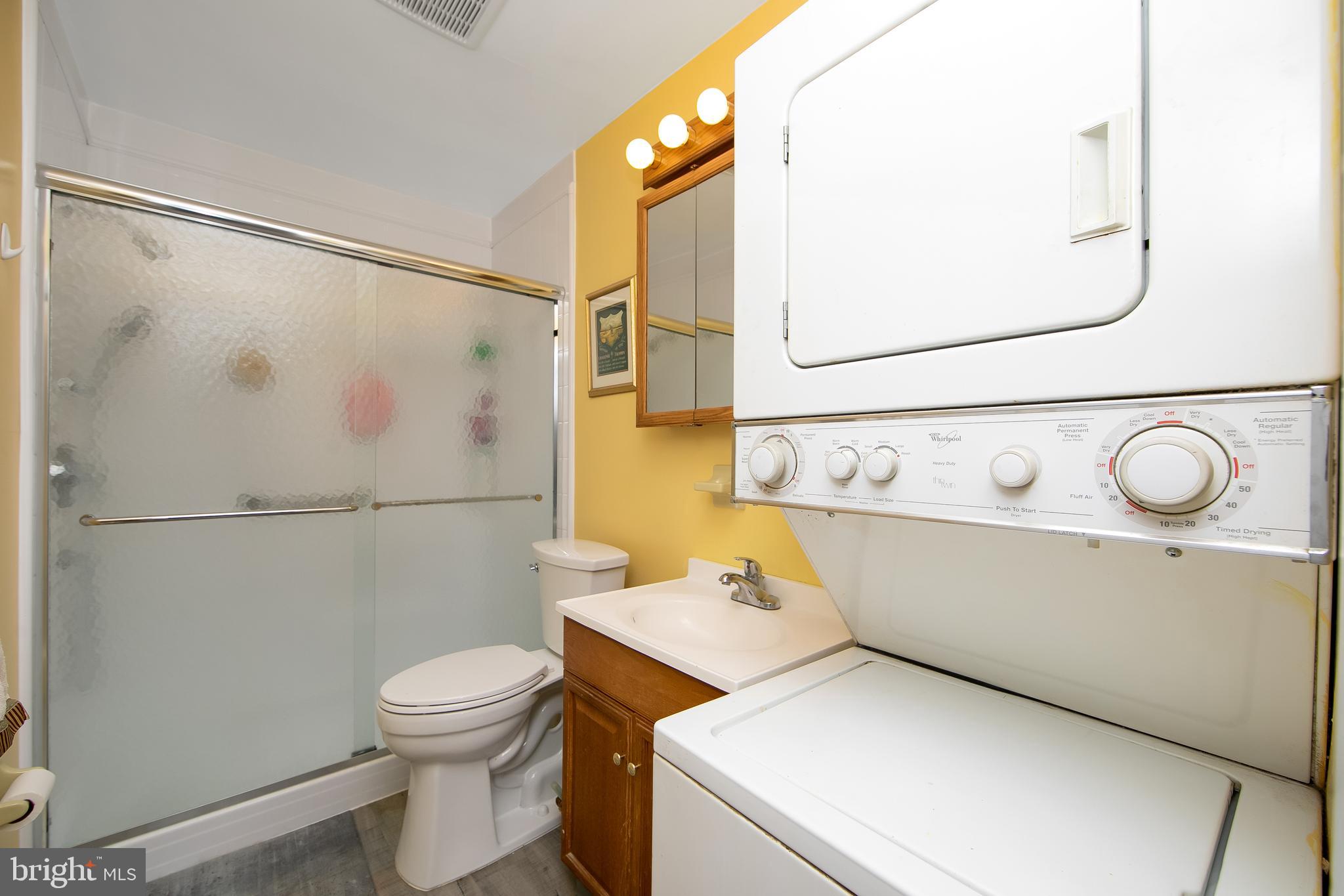 206 Winding Way Westville, NJ 08093 - Photo 10 of 20 a bathroom with a sink and a toilet