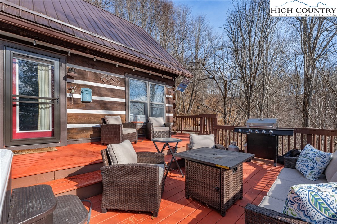 419 Billy Billings Road Vilas, NC 28692 - Photo 7 of 50 a outdoor living space with patio furniture
