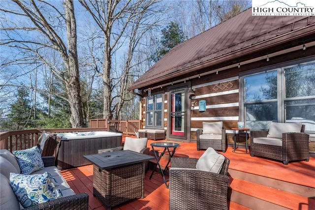 a view of a swimming pool with a sitting space