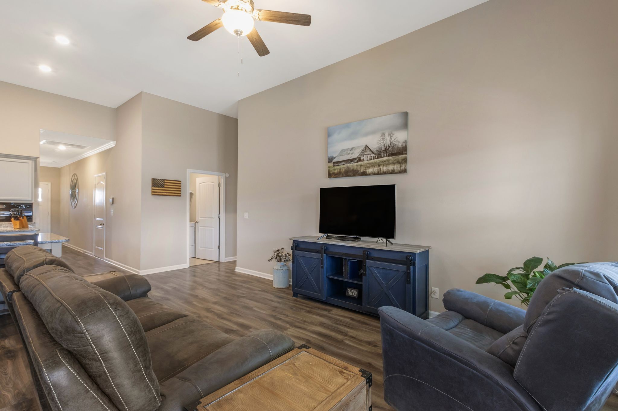 369 Ruby Cate Way Murfreesboro, TN 37128 - Photo 16 of 35 a living room with furniture and a flat screen tv