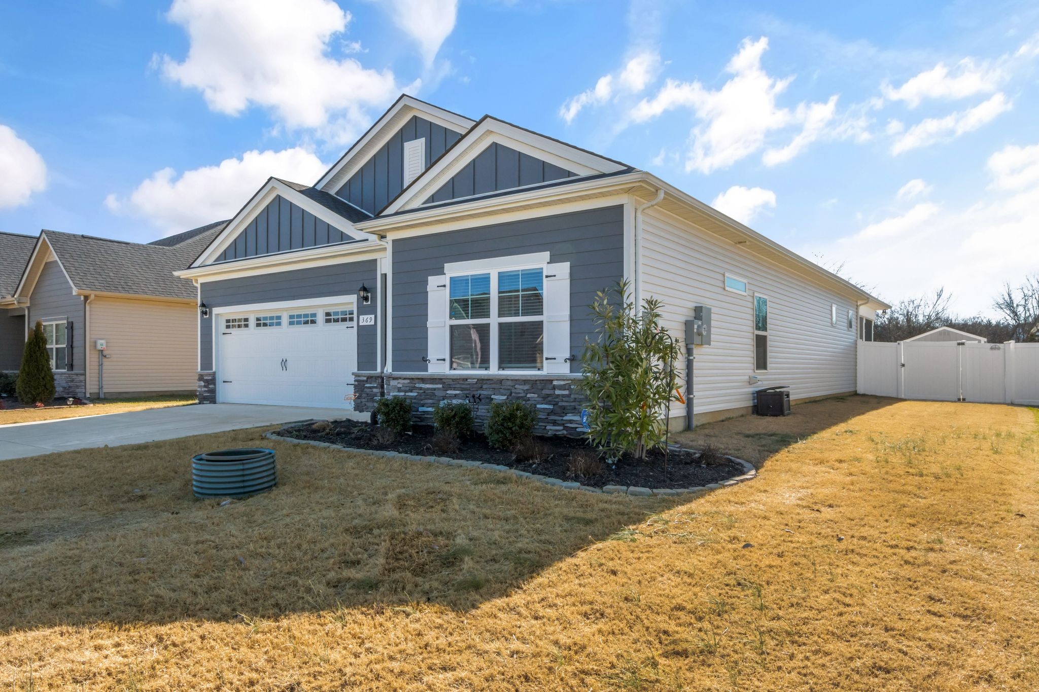 369 Ruby Cate Way Murfreesboro, TN 37128 - Photo 34 of 35 a front view of a house with a yard