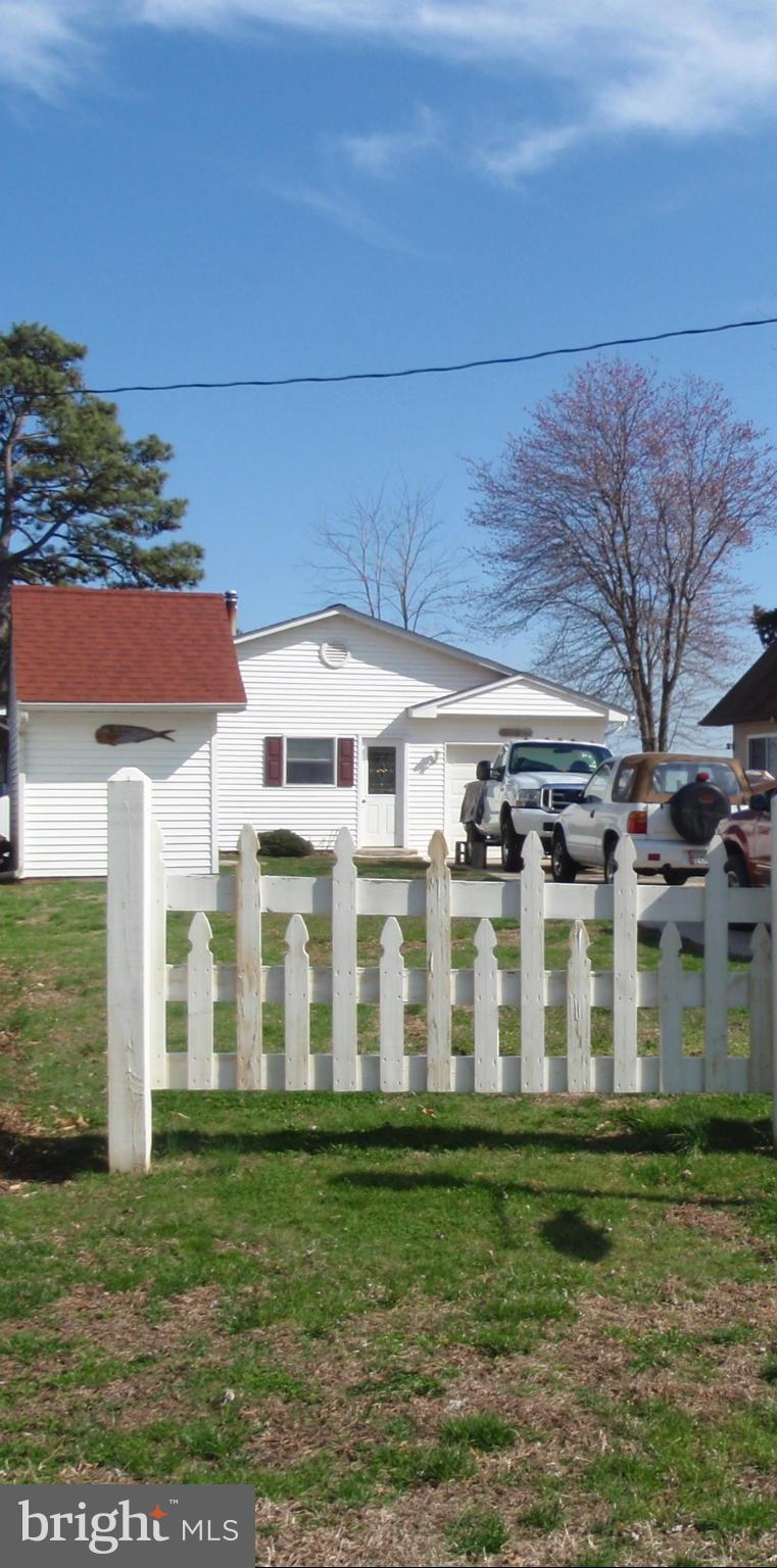 38431 Bayview Road Coltons Point, MD 20626 - Photo 17 of 25 a front view of building with yard