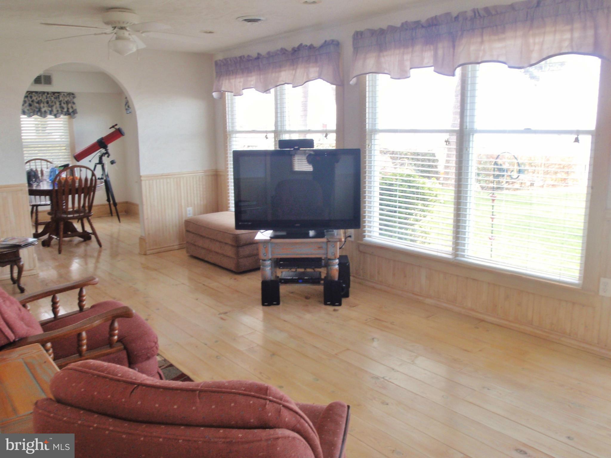 38431 Bayview Road Coltons Point, MD 20626 - Photo 7 of 25 a living room with furniture and a window