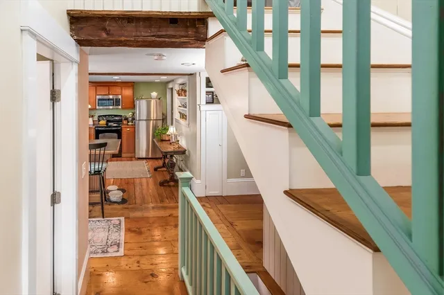 a bedroom with a bed and closet