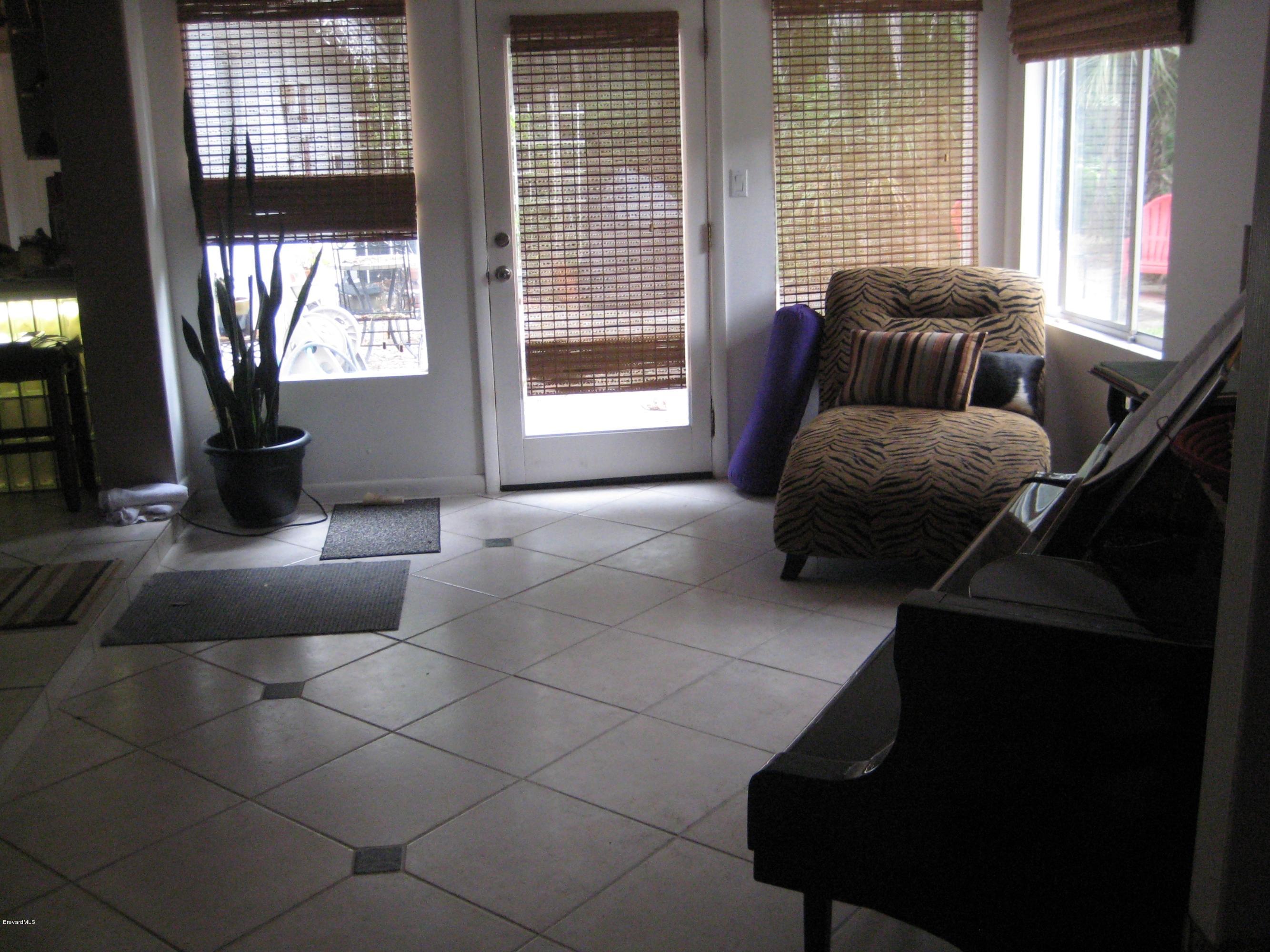515 Poinsettia Road Melbourne Beach, FL 32951 - Photo 3 of 10 Entrance to Great Room from Patio