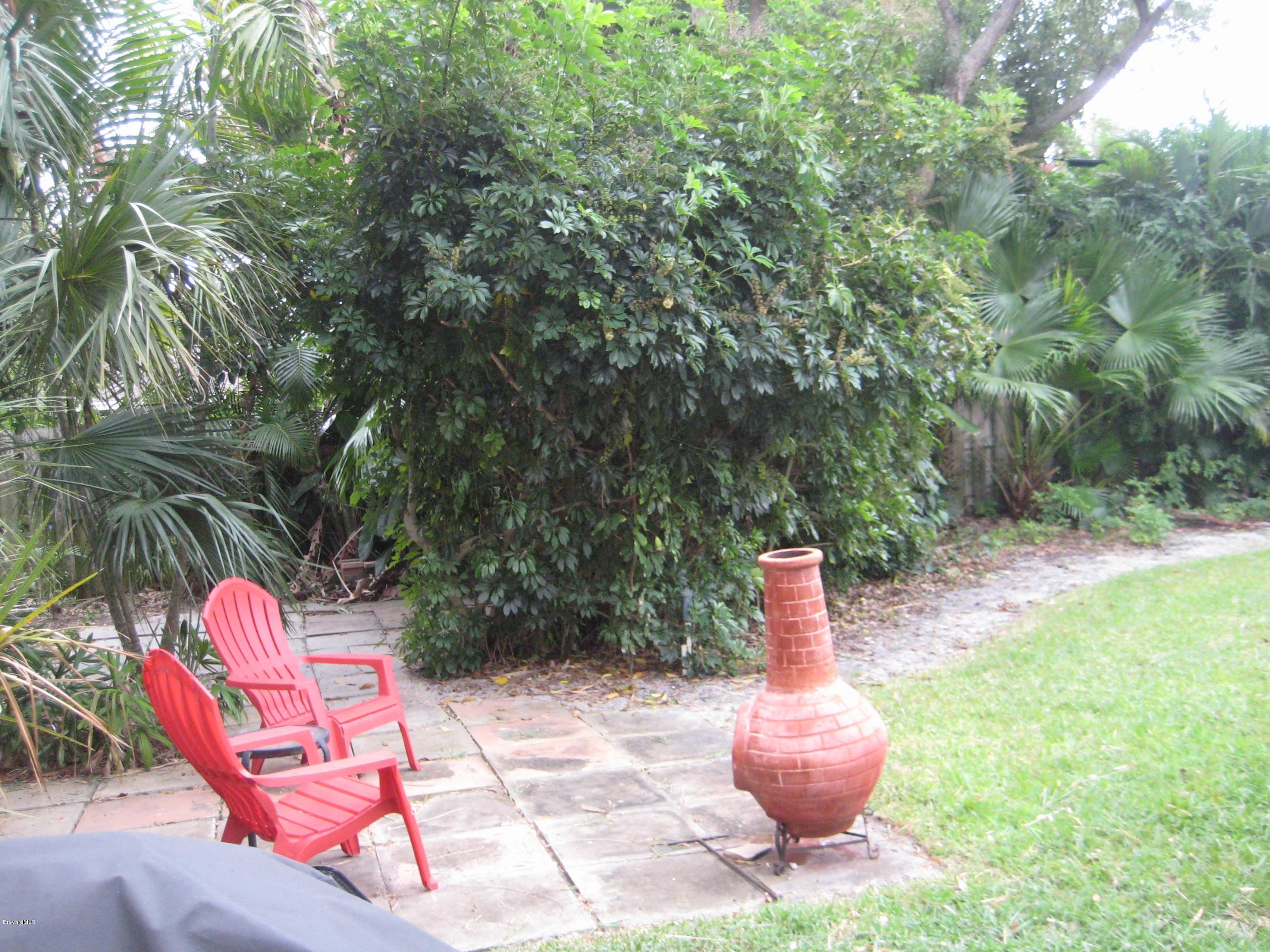 515 Poinsettia Road Melbourne Beach, FL 32951 - Photo 6 of 10 Backyard Sitting Area View 1