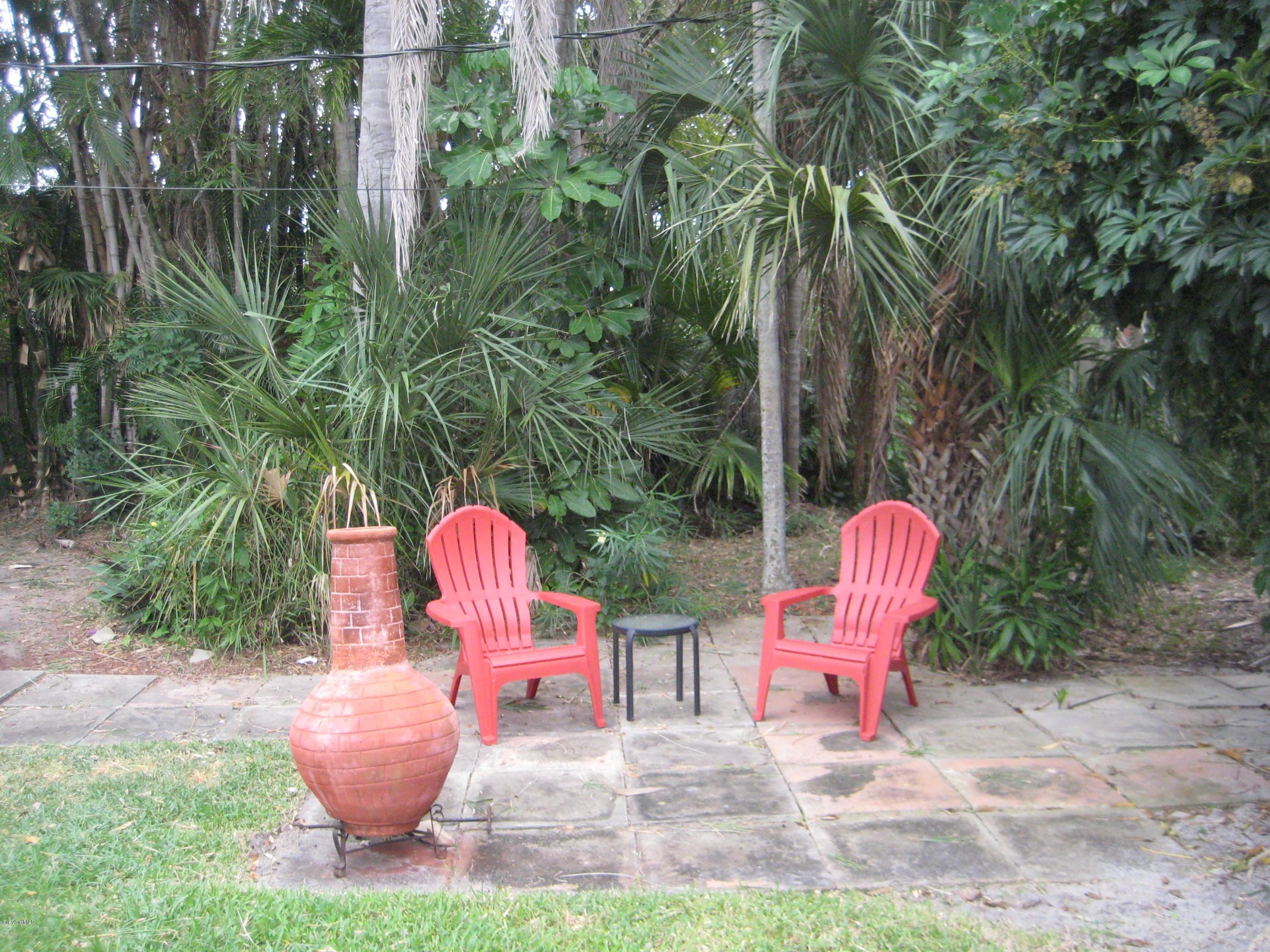 515 Poinsettia Road Melbourne Beach, FL 32951 - Photo 7 of 10 Backyard Sitting Area