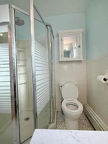 a front view of a house with a garage