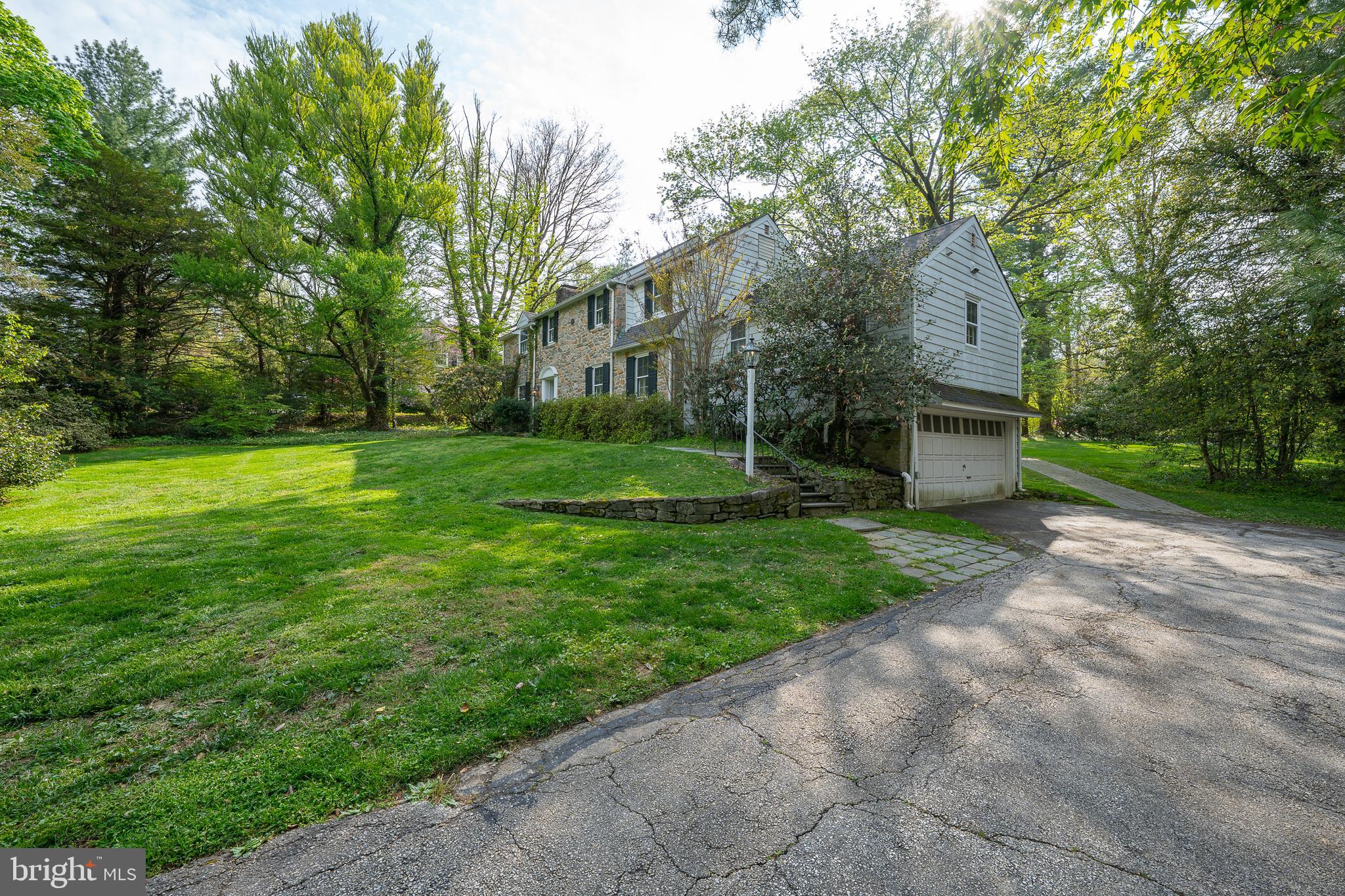 510 Lynmere Road Bryn Mawr, PA 19010 - Photo 44 of 44 a view of a backyard with large trees