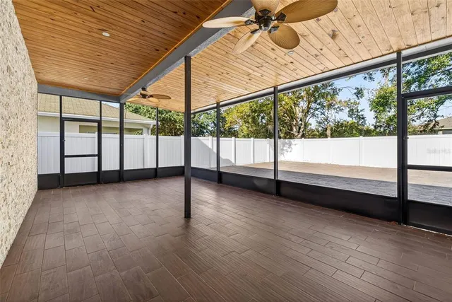 a view of a porch with wooden floor and stairs