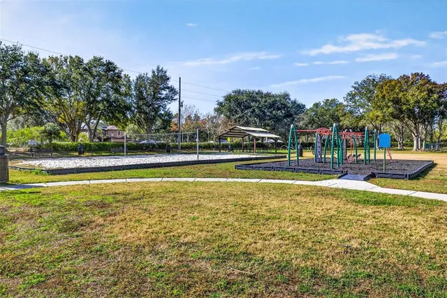 a view of an outdoor space and tennis court