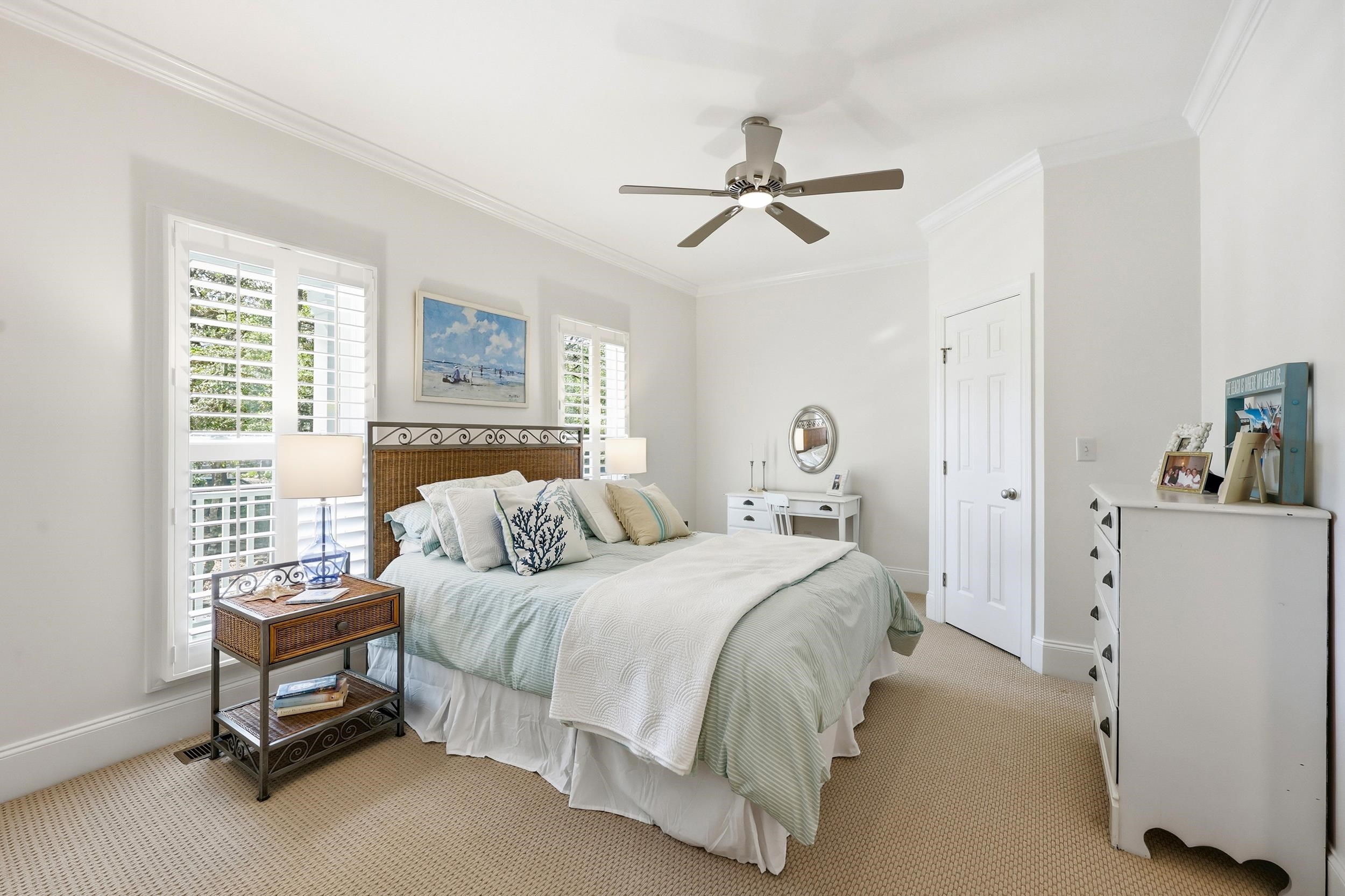 213 Old Carriage Loop Georgetown, SC 29440 - Photo 19 of 40 Bedroom featuring crown molding, carpet flooring, and a ceiling fan