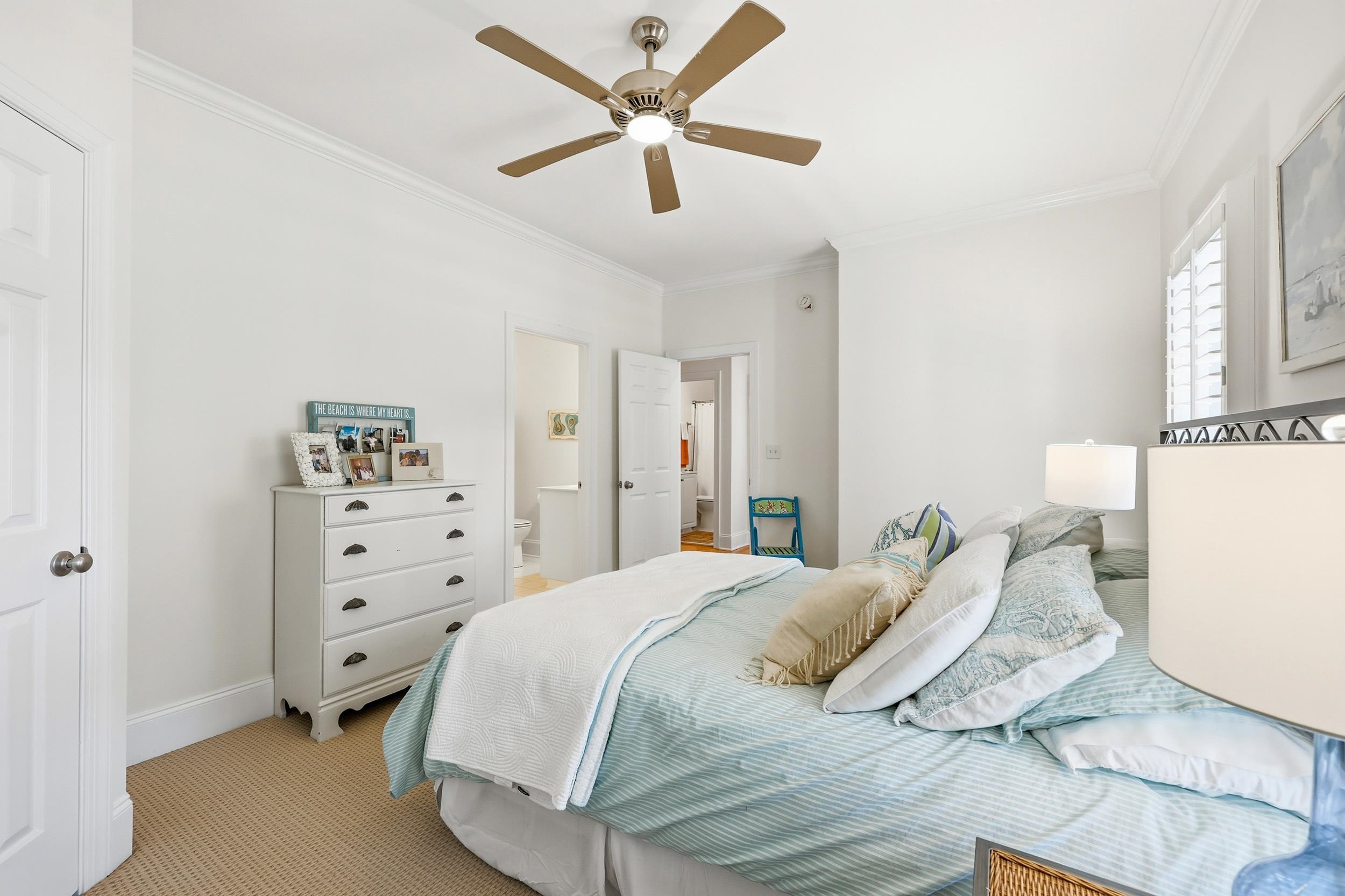 213 Old Carriage Loop Georgetown, SC 29440 - Photo 20 of 40 Bedroom with ornamental molding, carpet, and ceiling fan