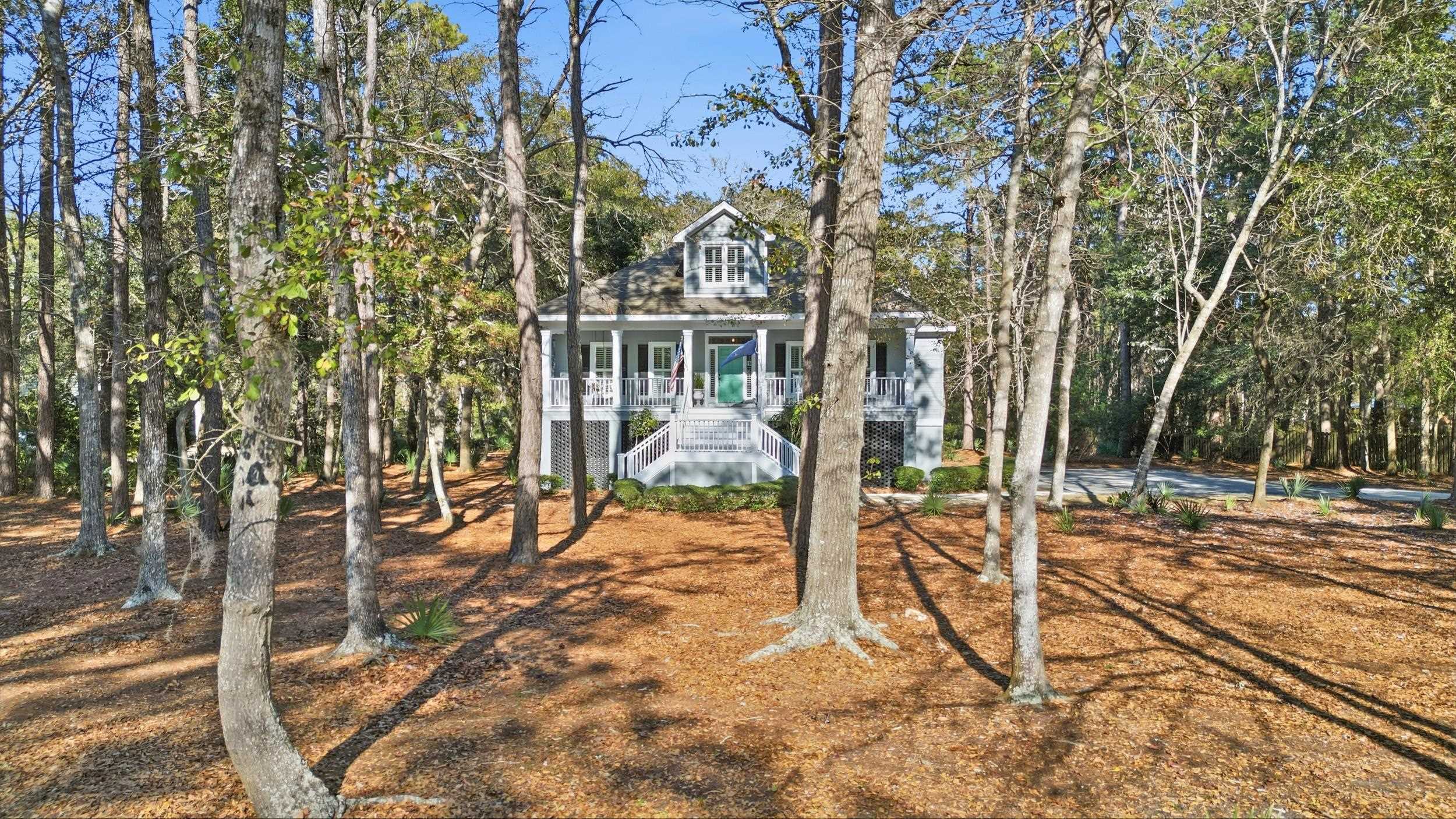 213 Old Carriage Loop Georgetown, SC 29440 - Photo 2 of 40 View of front of house with a porch and stairway