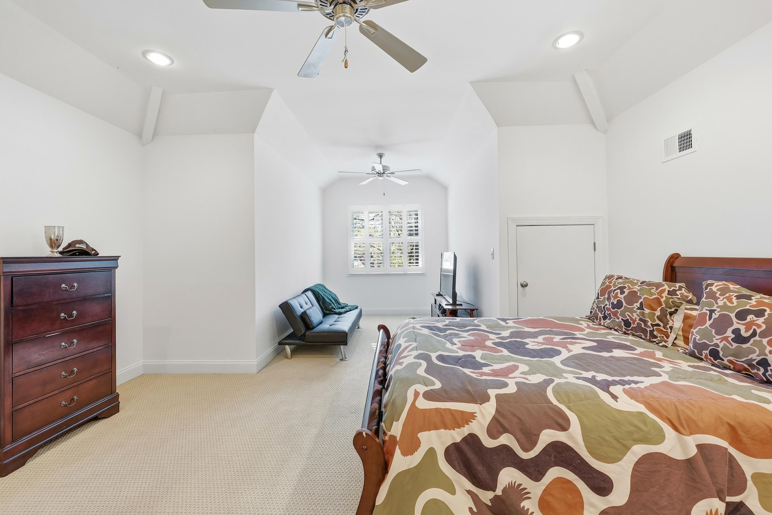 213 Old Carriage Loop Georgetown, SC 29440 - Photo 29 of 40 Bedroom featuring lofted ceiling, light carpet, a ceiling fan, and recessed lighting