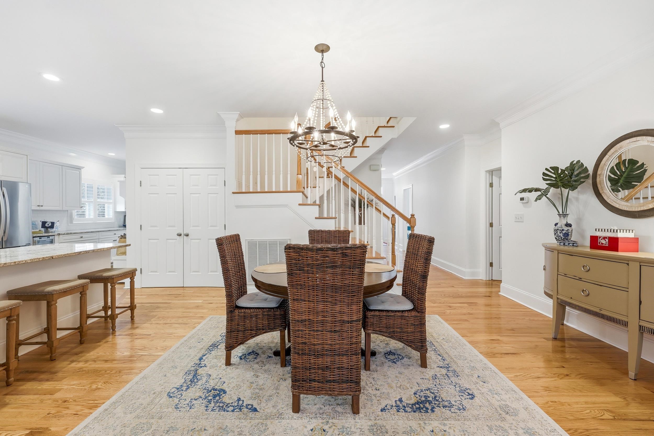 213 Old Carriage Loop Georgetown, SC 29440 - Photo 10 of 40 Dining area featuring light wood-type flooring, ornamental molding, a chandelier, and recessed lighting