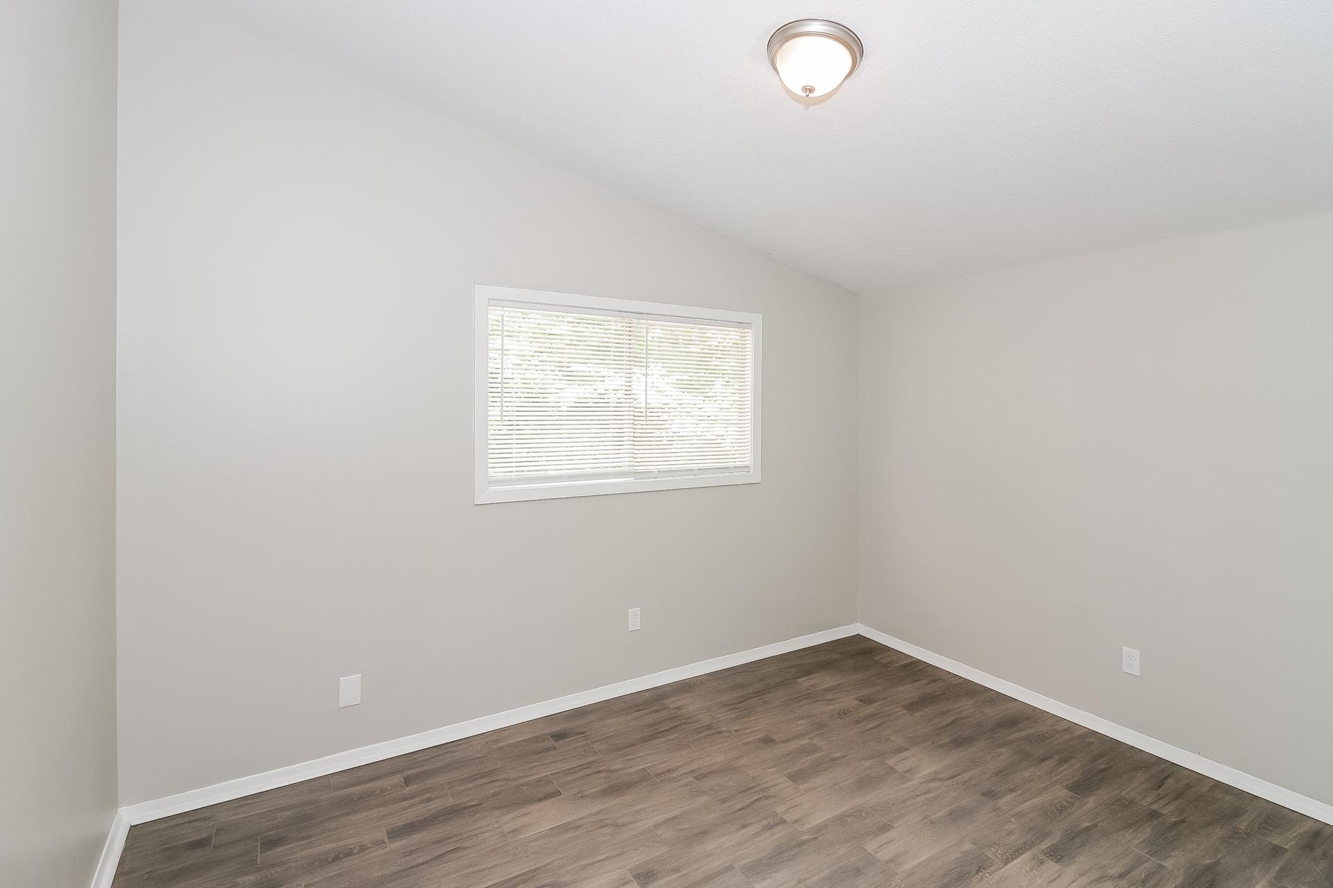 4217 Windermere Road Memphis, TN 38128 - Photo 12 of 15 an empty room with a window