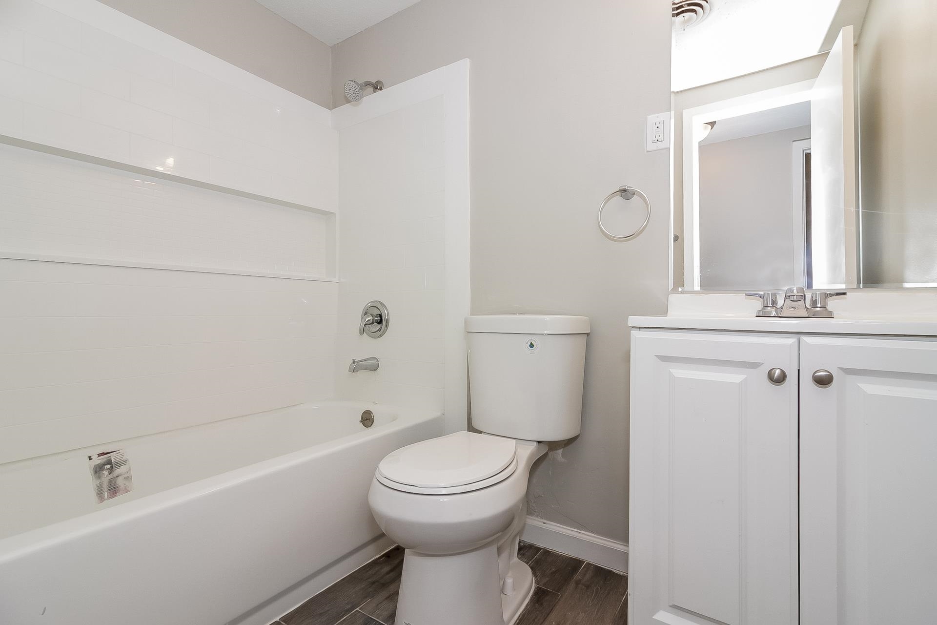 4217 Windermere Road Memphis, TN 38128 - Photo 13 of 15 a bathroom with a toilet sink shower and mirror