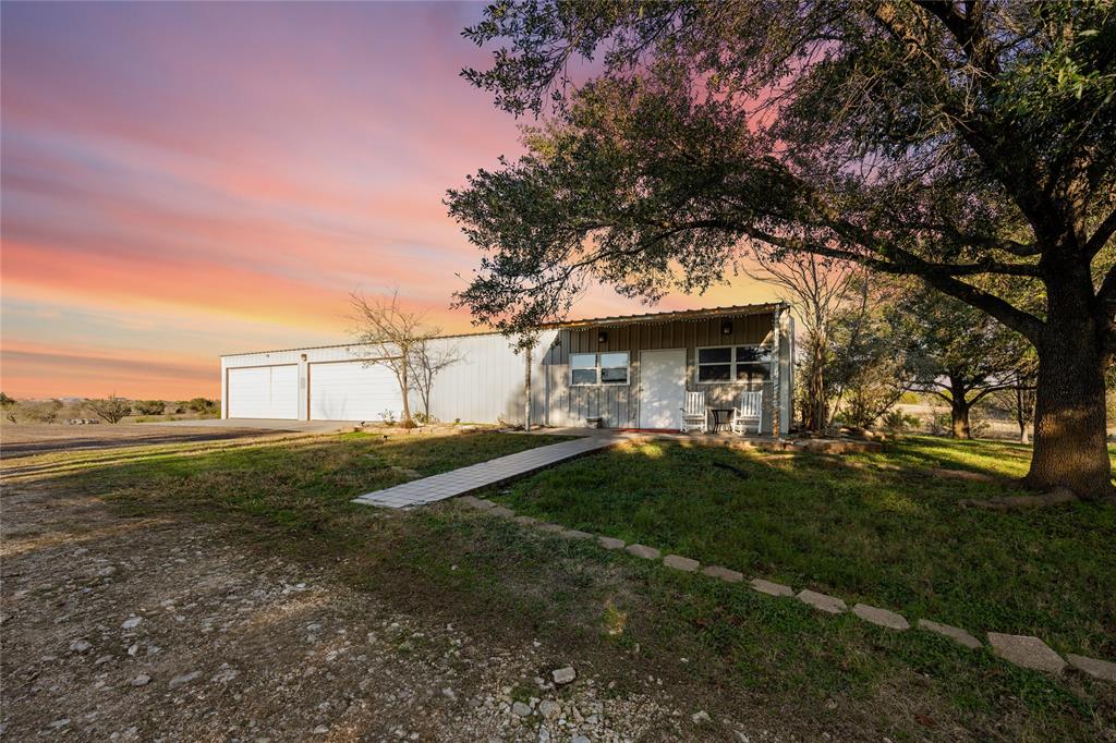 20131 China Spring Road Valley Mills, TX 76689 - Photo 18 of 40 Front of garage/shop and apartment