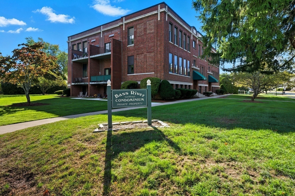 30 Conant Street, Unit 3B Beverly, MA 01915 - Photo 22 of 30 a view of a house with a yard